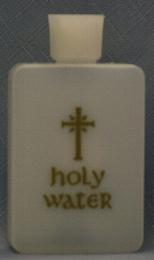 HOLY WATER BOTTLE W/ GOLD WRITING.